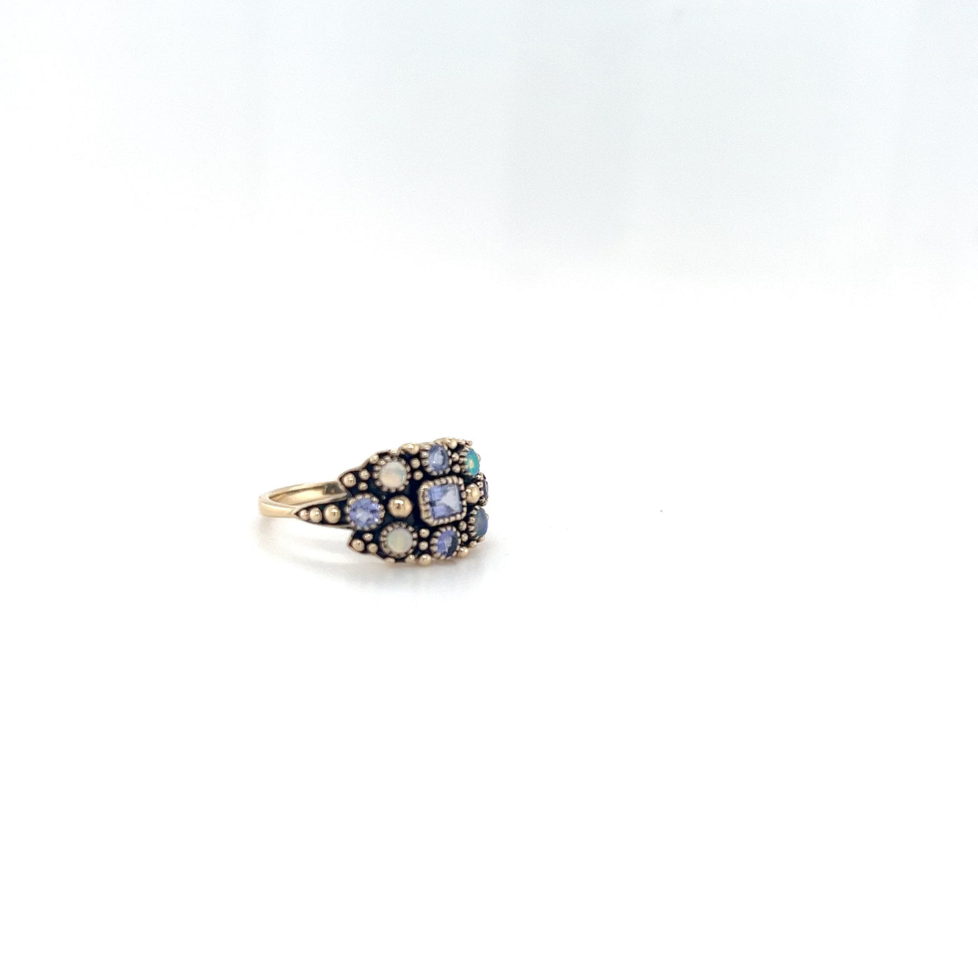 9 Carat Yellow Gold Ring with Tanzanite and Solid Opal.