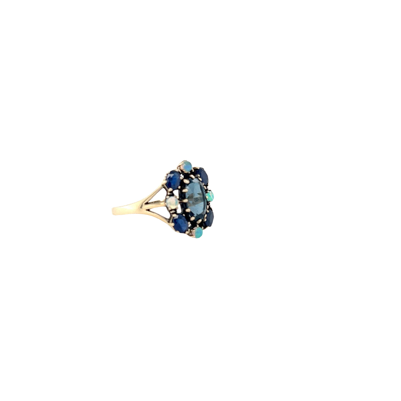 9 carat yellow gold ring with london blue topaz, sapphire and opals.