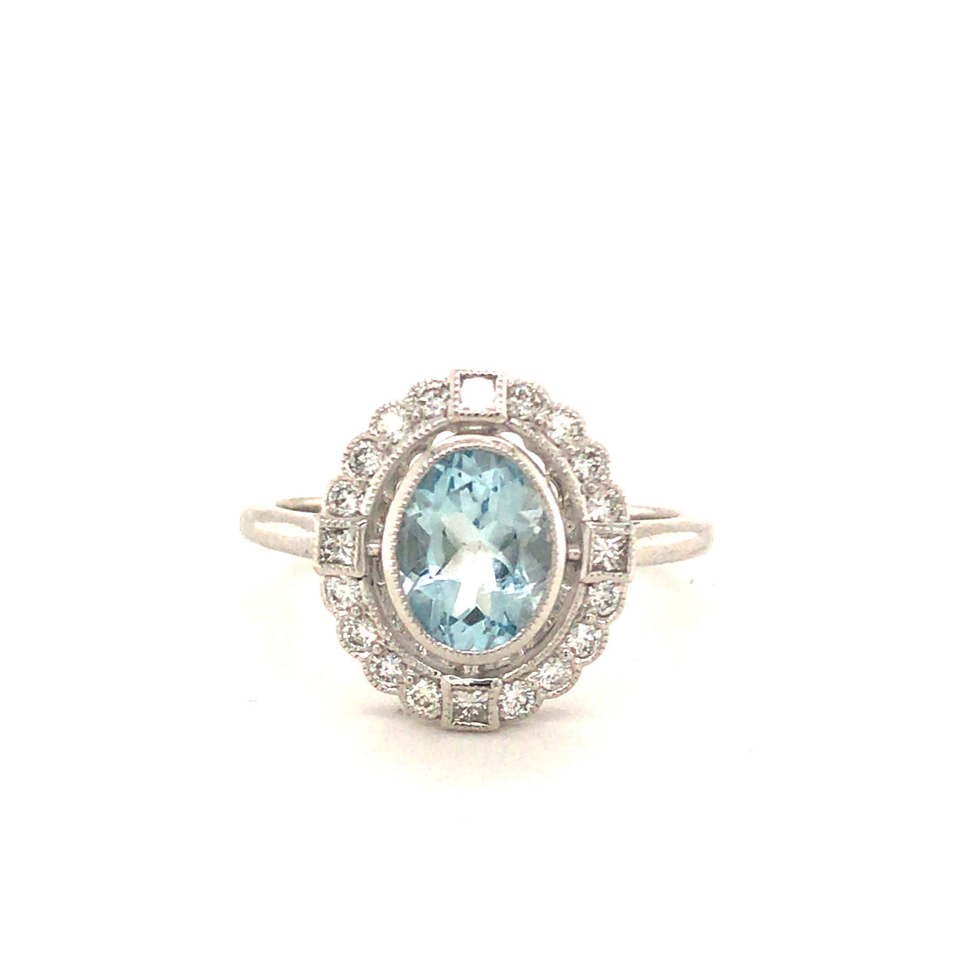 9ct aquamarine and diamond halo dress ring