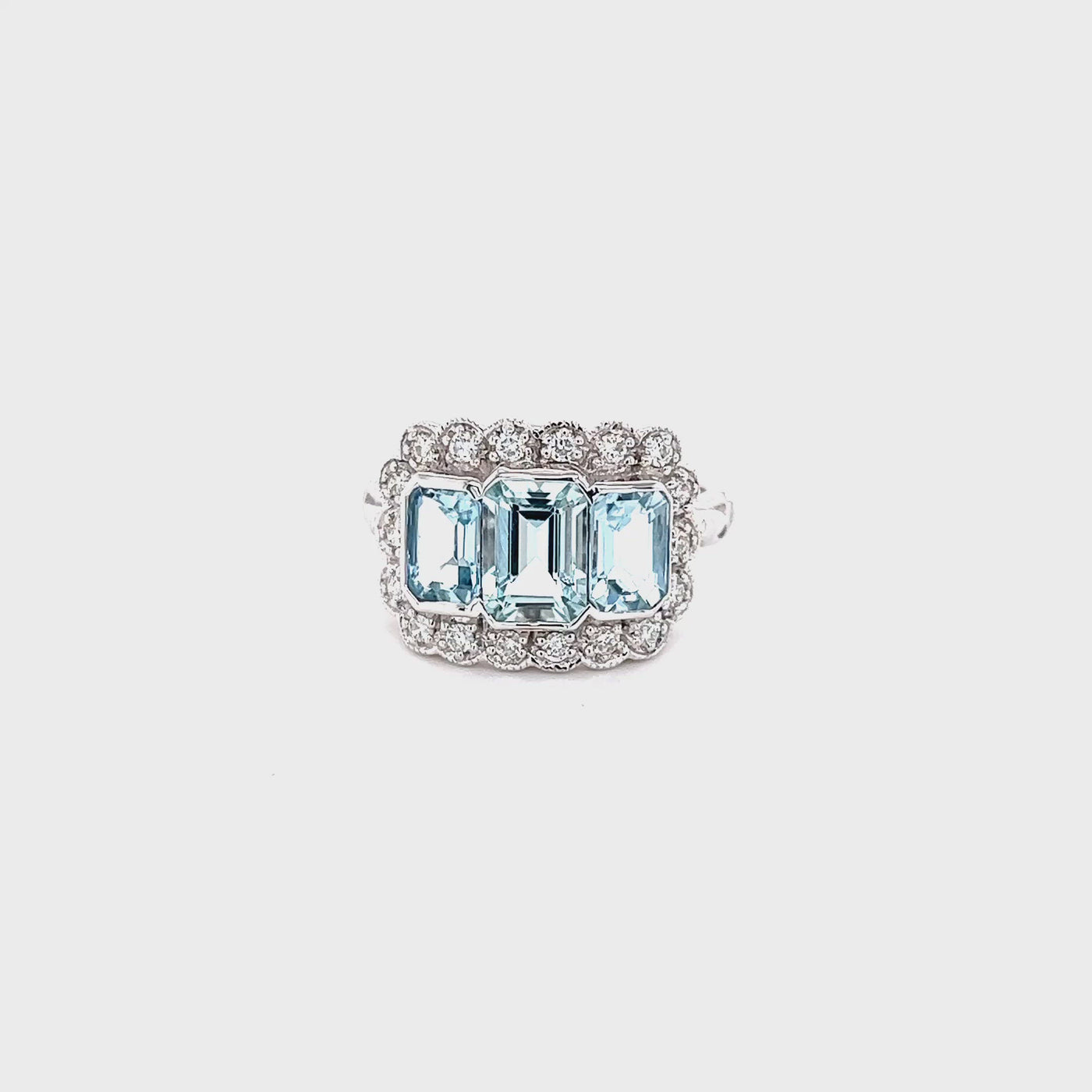 9ct aquamarine and diamond halo dress ring