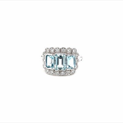 9ct 3 stone aquamarine ring surrounded by diamonds