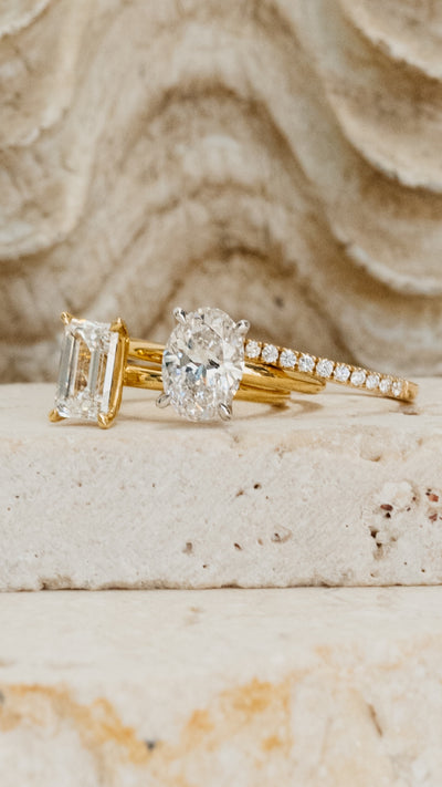 Two diamond rings on a stone setting