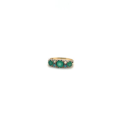 9 Carat yellow gold ring with emerald and opal.