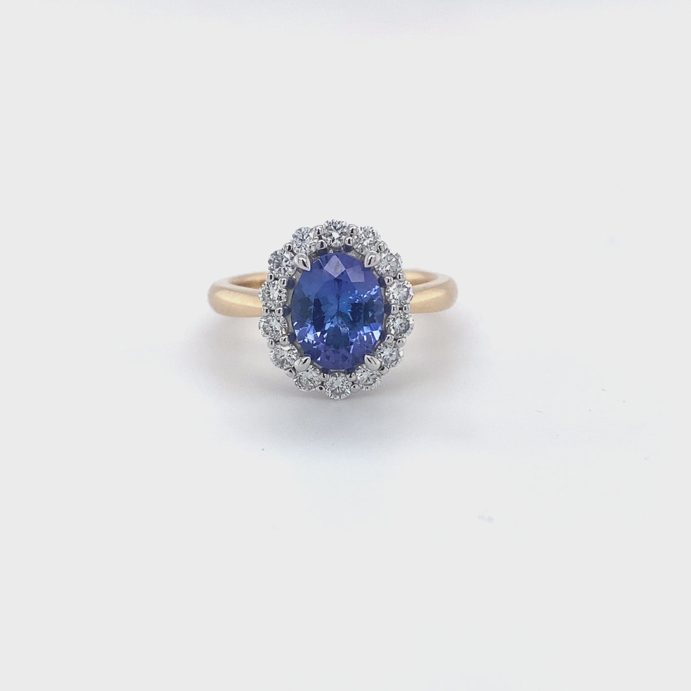 Yellow Gold Tanzanite Diamond Halo Ring