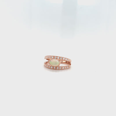 9 CARAT ROSE GOLD RING WITH SOLID OPAL AND DIAMONDS