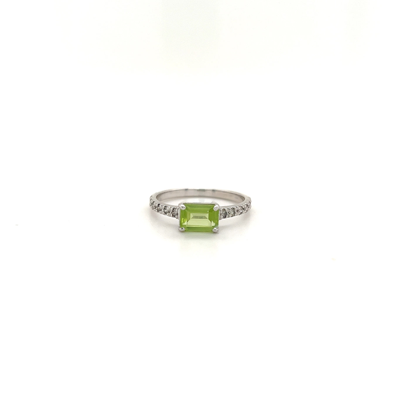 9ct emerald cut peridot and diamond ring