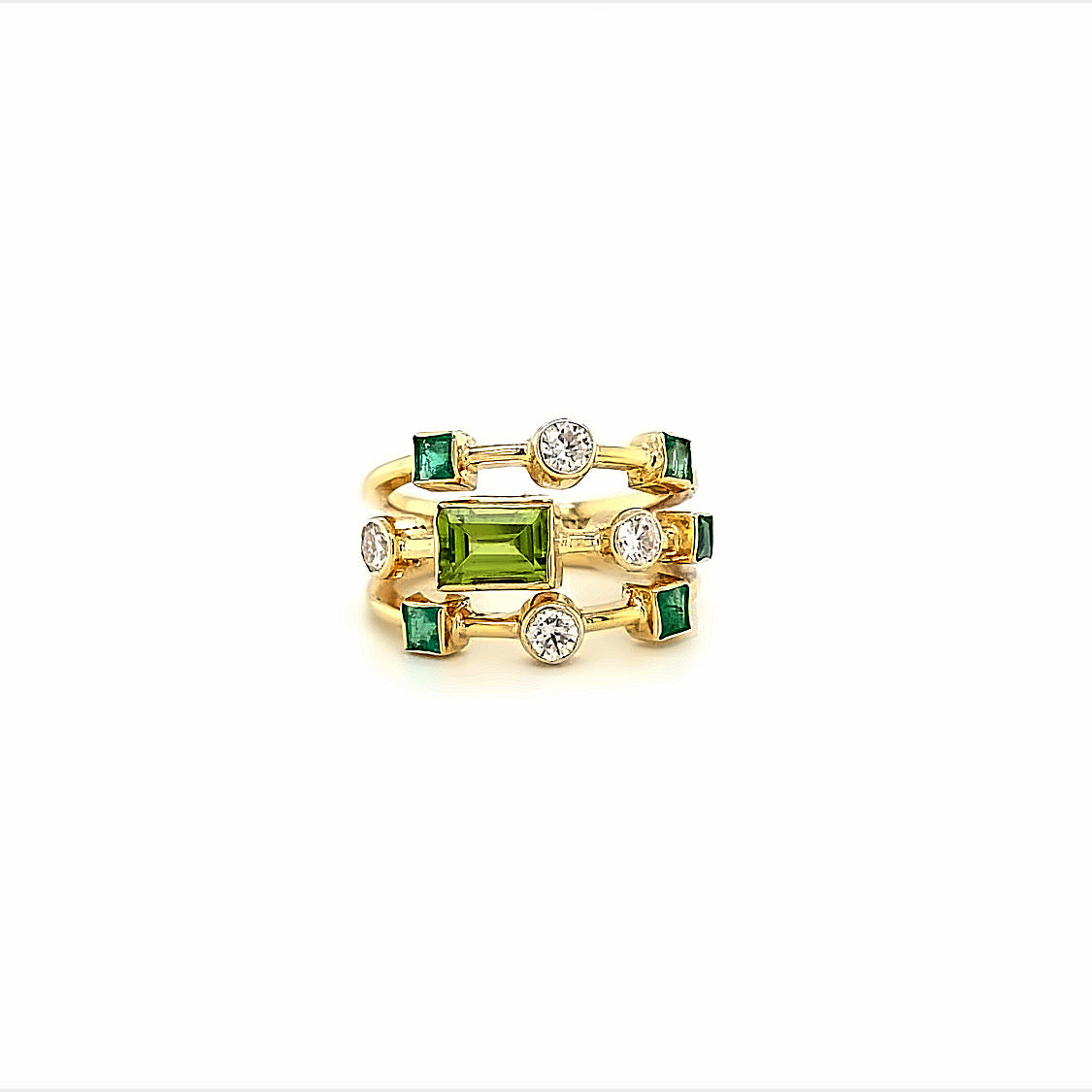 9ct yellow gold peridot, emerald and moissanite dress ring.