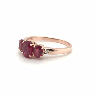 9ct ruby oval trilogy dress ring side view