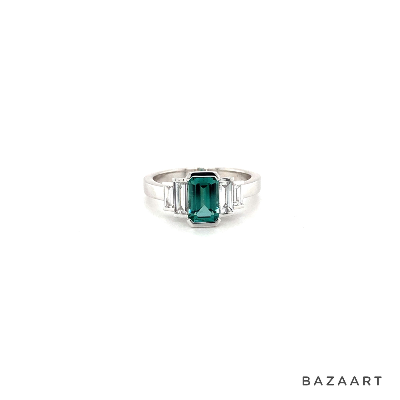 9ct white gold, emerald cut blue green tourmaline bar set with graduating baguette shoulder diamonds.