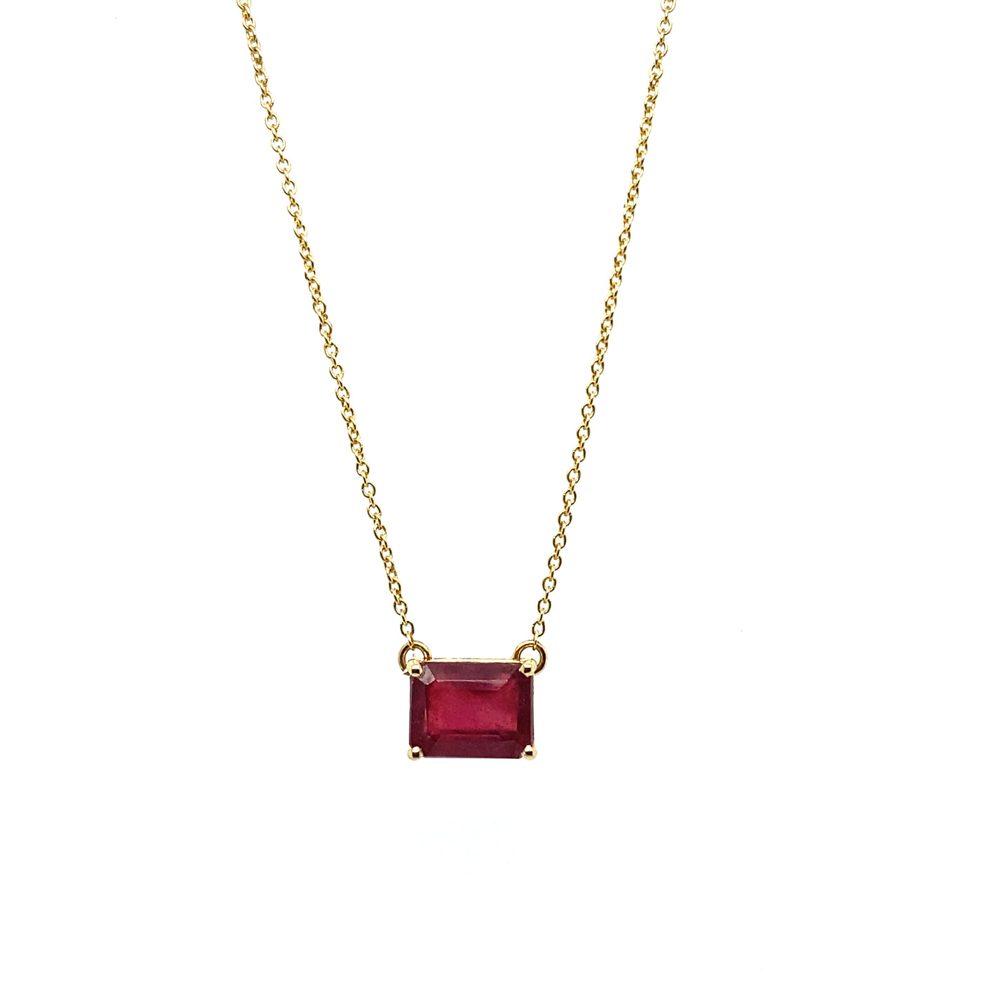 14ct yellow gold and emerald cut ruby, east to west style necklace.