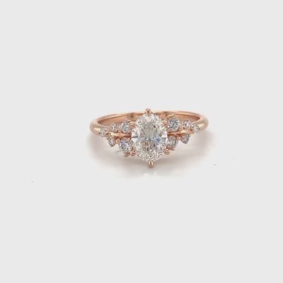 9ct rose gold and eco diamond engagement ring featuring a 1.0ct oval centre and .20ct round brilliant cut accent diamonds video