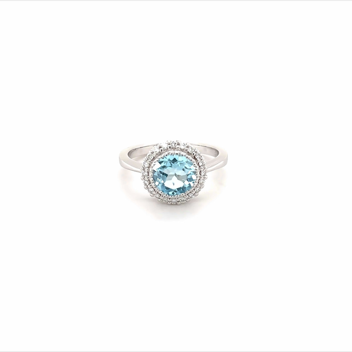9ct white gold sky blue topaz and diamond halo ring