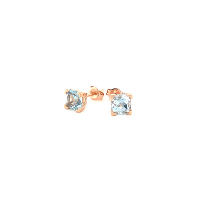 9ct rose gold and cushion cut blue topaz studs