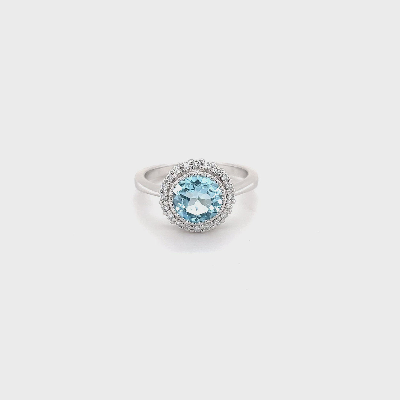 9ct white gold sky blue topaz and diamond halo ring video