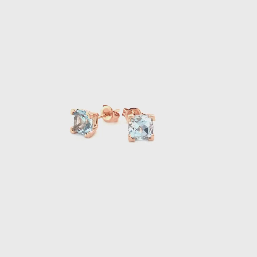 9ct rose gold and cushion cut blue topaz studs video