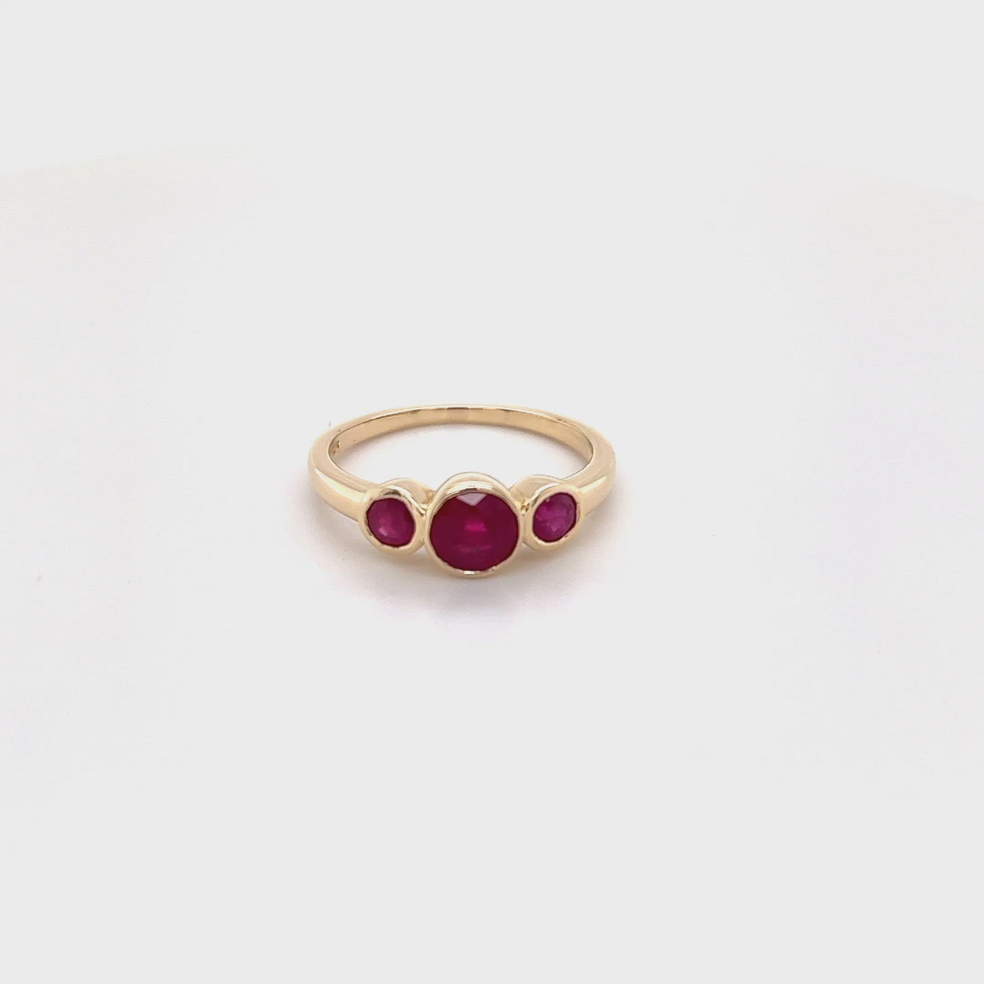 9ct bezel set ruby trilogy ring